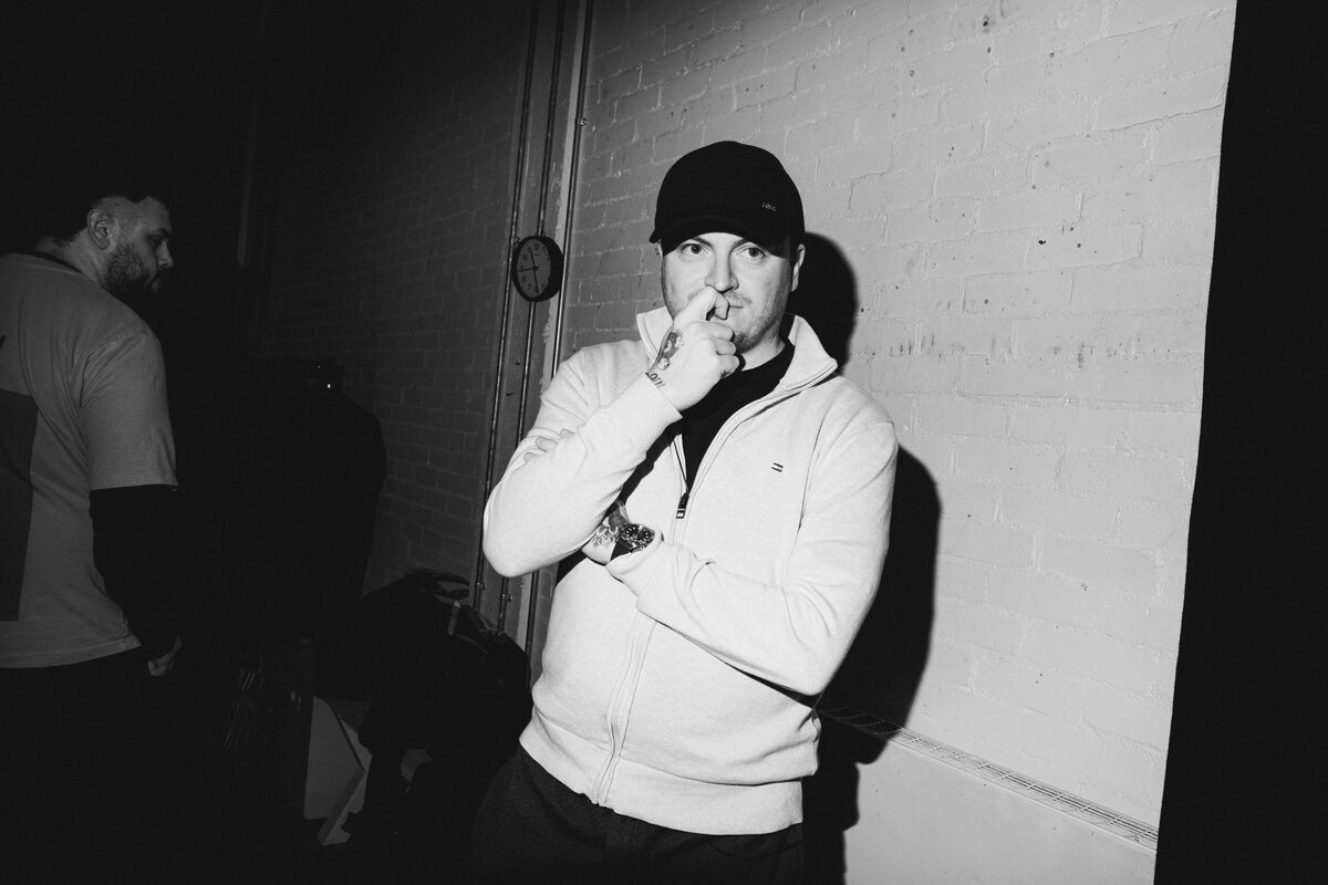 Jamie Eastlake photographed backstage in black and white