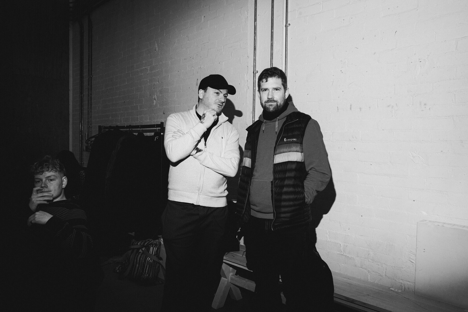 Eastlake Productions company members backstage in black and white